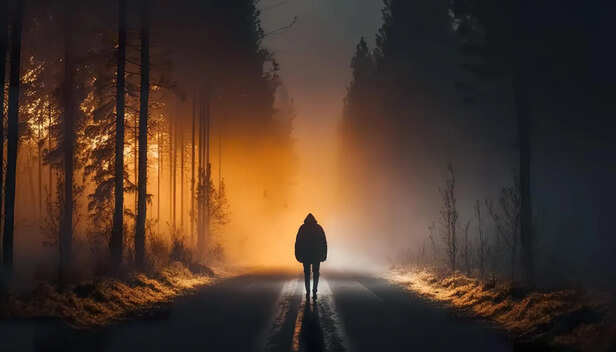 Person Standing Alone on an Empty Road