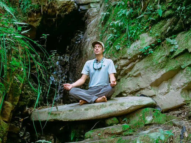 Person meditating calmly in nature