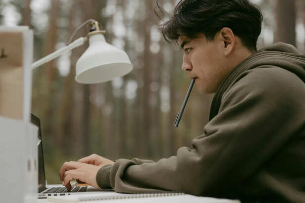 Person working with focus and dedication