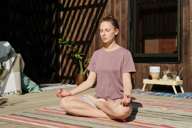 Person meditating peacefully