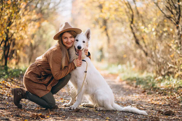 Woman in park with her dog