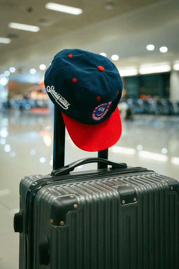 Pexels | The Face-Printed Luggage Trend Going Viral