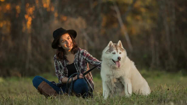 Girl with husky