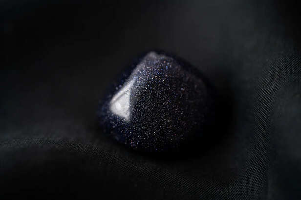Black Tourmaline Near Laptop Workspace