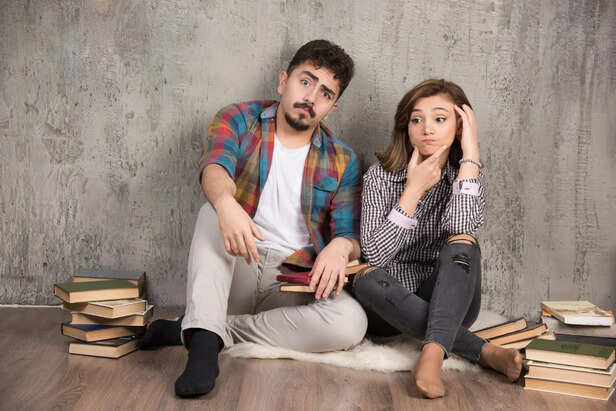 Person Overthinking While Looking at Phone