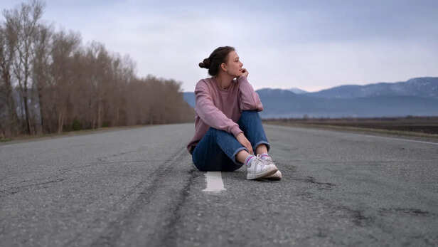 Lonely road symbolising fear of moving forward