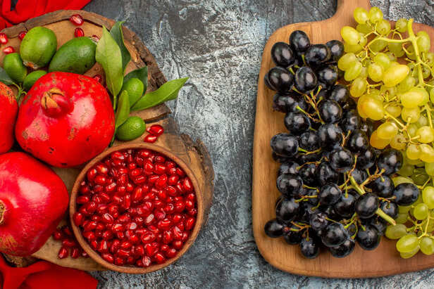 Fresh amla, beetroot, grapes, and pomegranate