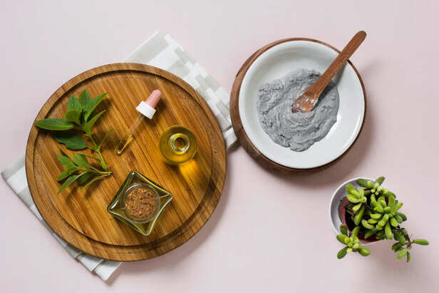 Homemade natural hair dye paste in a bowl