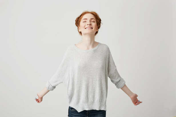 Person Feeling Relaxed In Simple Clothes