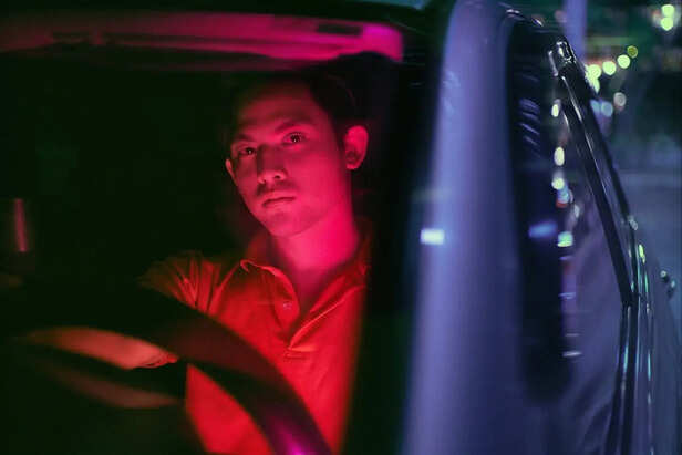 Driver struggling with bright lights at night