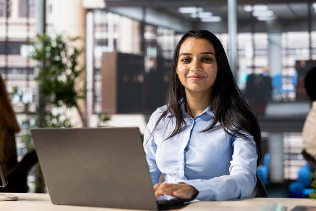 Young Indian Woman Working Confidently