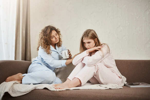 Young Woman Sharing Emotional Struggles With Family