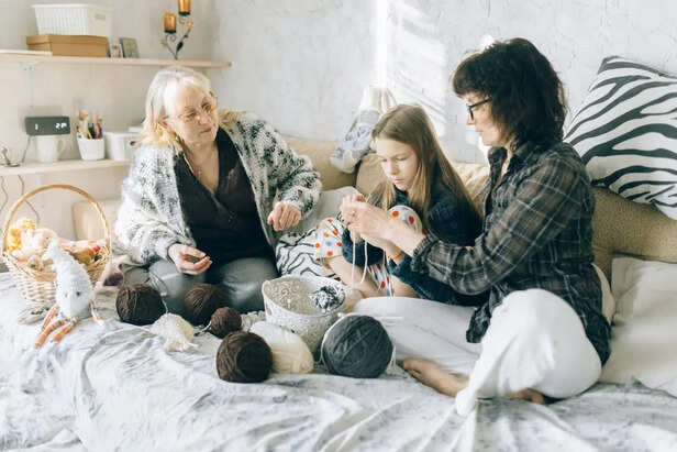 Young children learning Crochet