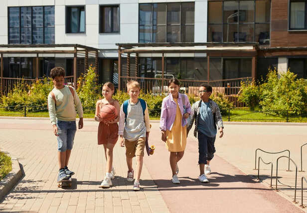 Group of Young Friends Talking After School