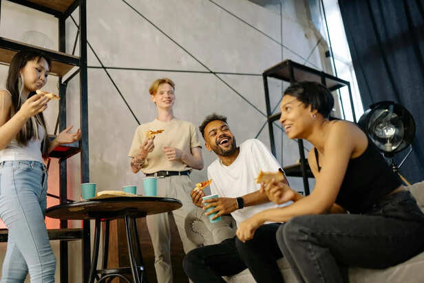 Diverse Group of Friends Sharing a Laugh Together
