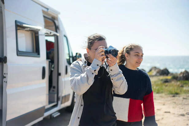 Friends Recording Content During a Road Trip