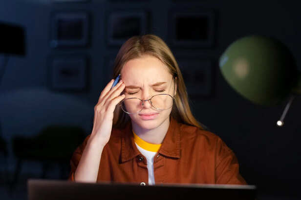 Person Relaxing Eyes After Screen Exposure