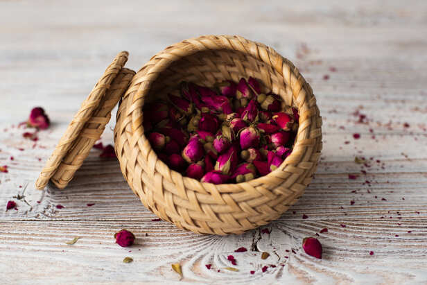 Fresh rose petals with traditional rose water