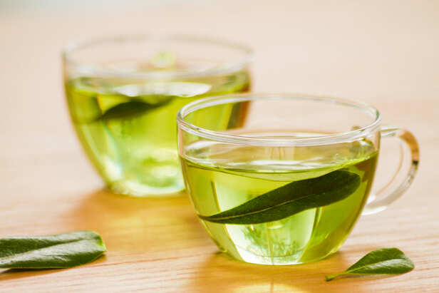 Freshly Brewed Green Tea With Natural Tea Leaves