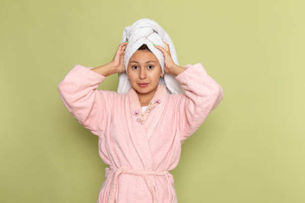 Person Gently Drying Wet Hair