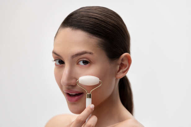 Facial Massage Using a Gua Sha Tool