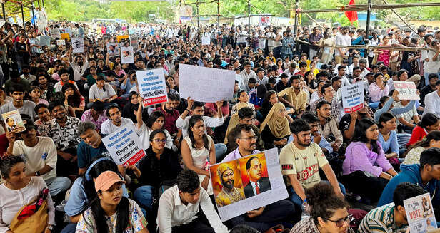 Students hold a sit-in protest in support of environmental...