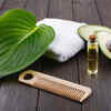 Pure castor oil with wooden comb and hair brush