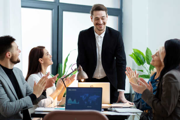 Confident leader inspiring a team