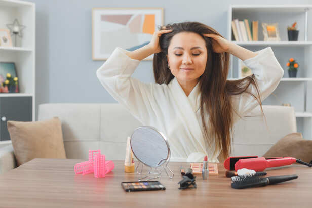 Woman Preparing Hair Before Bed