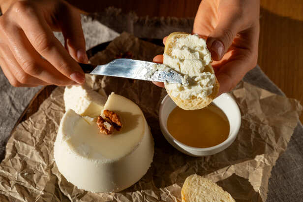 Fresh butter being prepared from churned curd