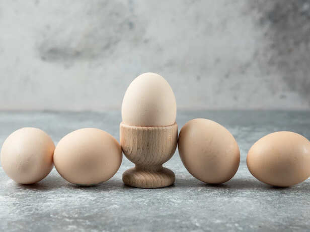 Brown and White Eggs Side by Side