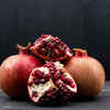 Fresh pomegranate seeds and fruit
