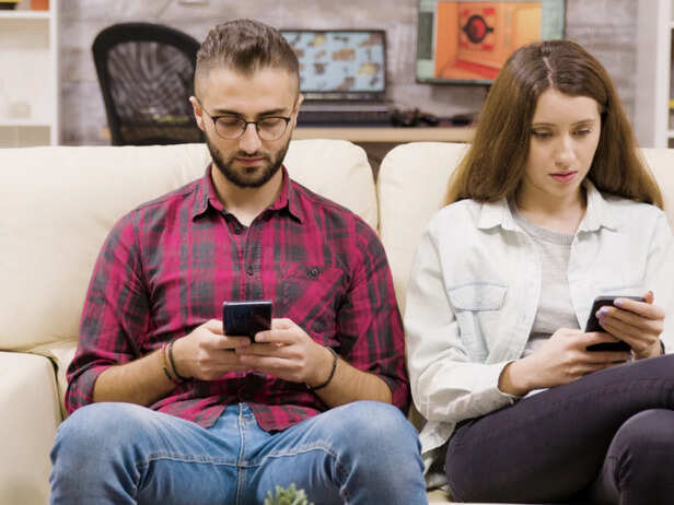 Adult comparing life while viewing social media