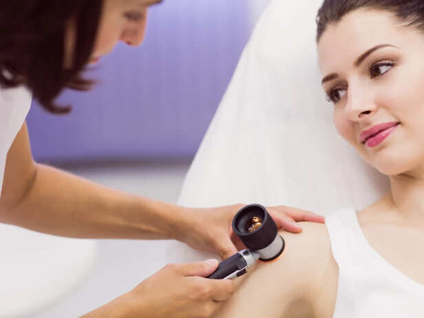 Dermatologist Examining Skin