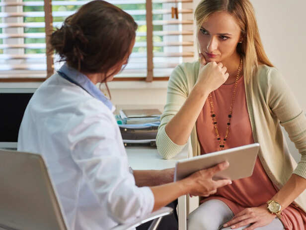 Woman Checking Her Health Symptoms
