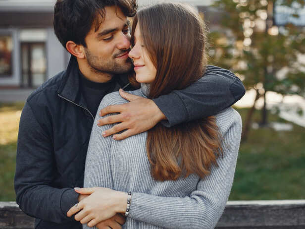 Couple Sharing a Subtle Touch