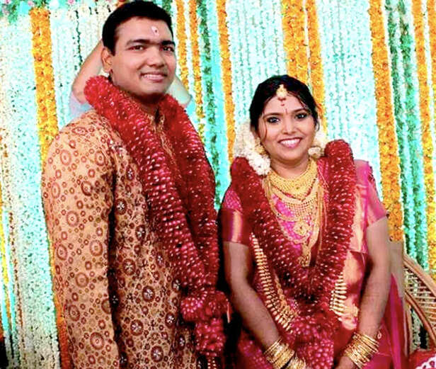 IAS Anju Arun Kumar with husband