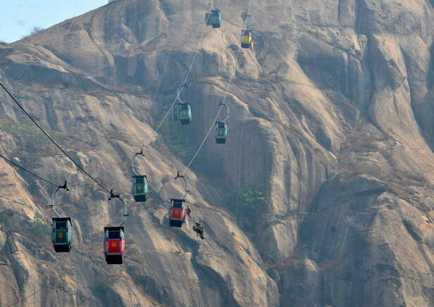 Cable-car collision kills two in India, leaves almost 50 trapped mid-air |  Reuters
