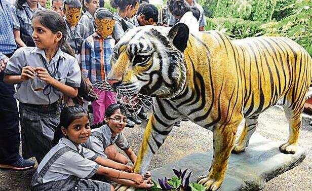 International Tiger Day: Schoolkids' rakhi date with a Royal Bengal at  Delhi zoo | Latest News Delhi