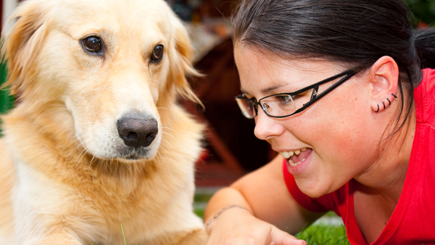 Stand close to your dog and say its name once in a cheerful voice