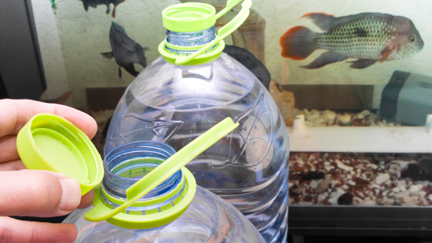 Remove a portion of the old water and replace it with appropriately treated water while maintaining stable conditions.