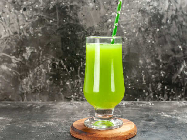 Amla water served with fresh gooseberries