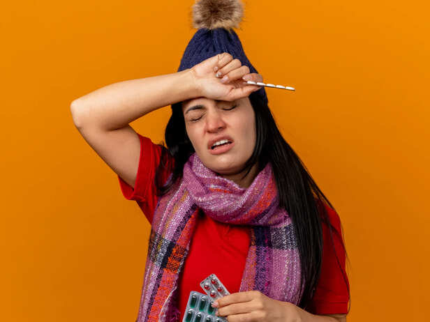 Woman With Fever and Flu Symptoms