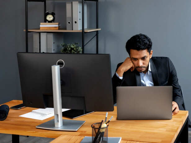Office Worker Sitting at a Desk for Hours