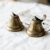 Brass Bell and Newspaper