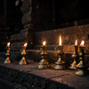 Temple Lamps Glow at Dusk