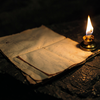 Ancient Manuscript and Lamp
