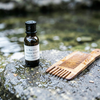 Bottle, Comb, and Water