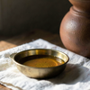 Warm oil, soft light.