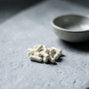 Pale Capsules on Stone
